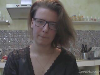 Solo lover with glasses chatting in the kitchen